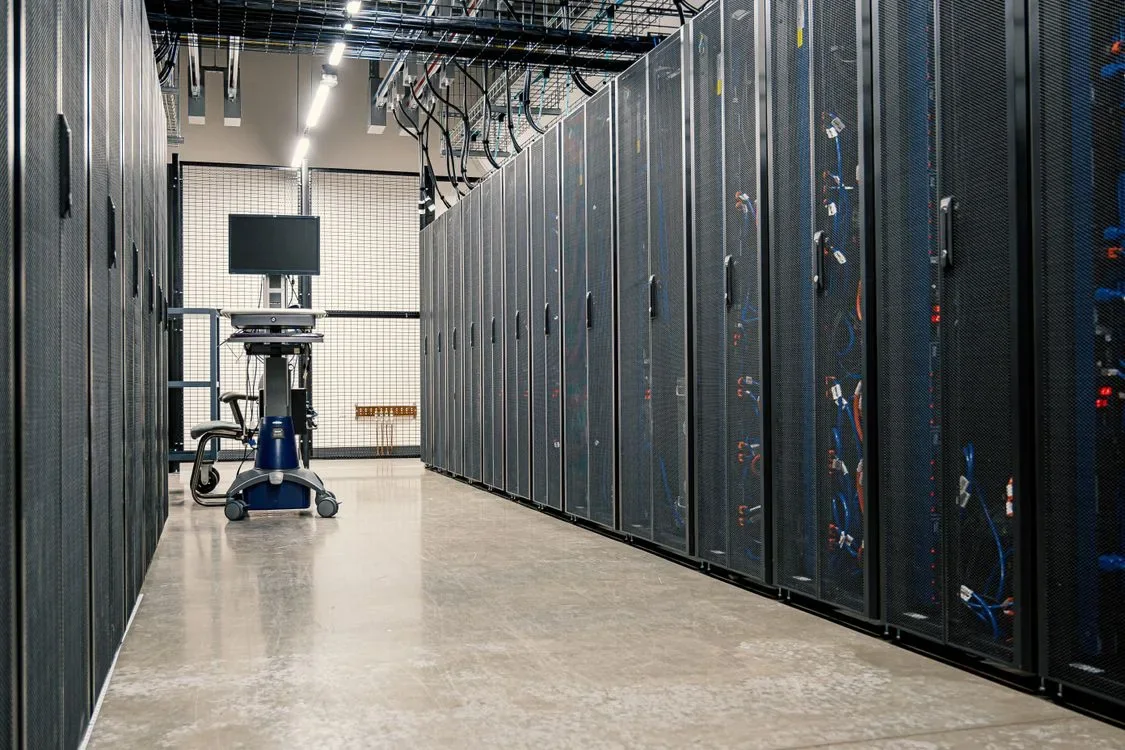 Server racks and diagnostic equipment in a data center aisle
